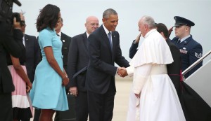 President Barack Obama and first lady Michelle Obama greet Pope Francis upon his arrival at Andrews Air Force Base, Md., Tuesday, Sept. 22, 2015. Andrew Harnik / AP